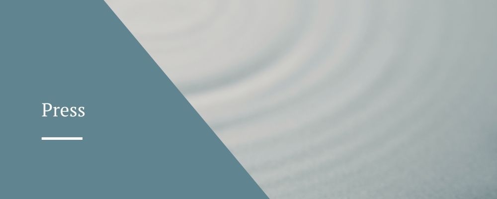 Teal press banner with soft ripple background